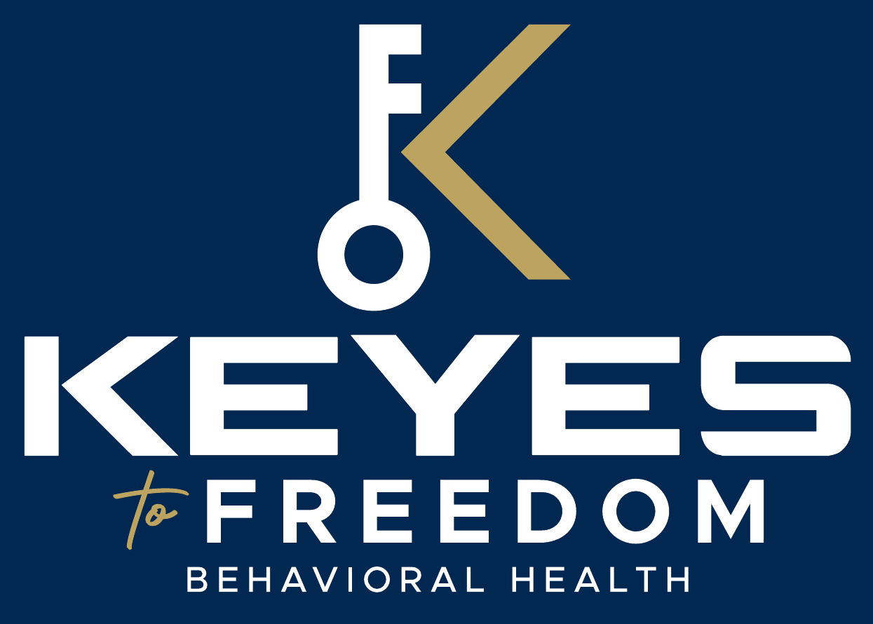 Keyes to Freedom Behavioral Health — white key and muted gold K logo